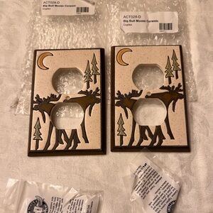 A pair (2) Big Bull Moose Ceramic Duplex Outlet Covers Brand New